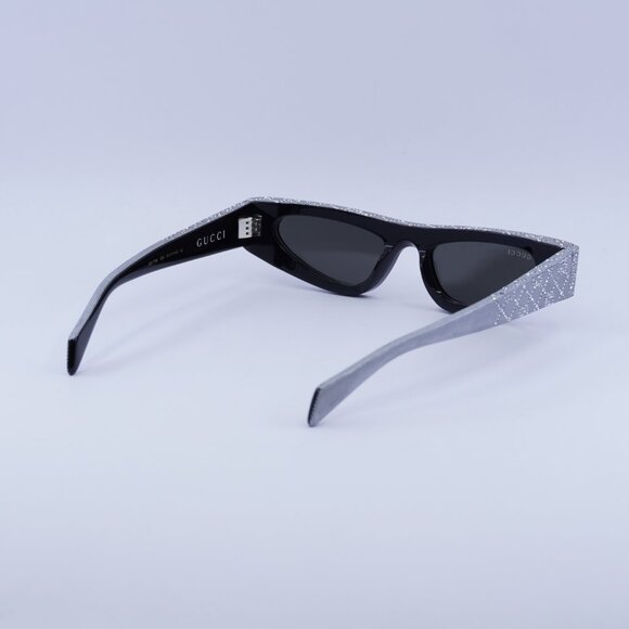 Gucci GG1779S 009 Sunglasses Black with Silver Metal Stud Detail Cat Eye Frame